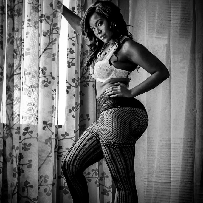 Female model photo shoot of Fahtima by Black Tie Wedding Photo in Hilton Oakbrook suite