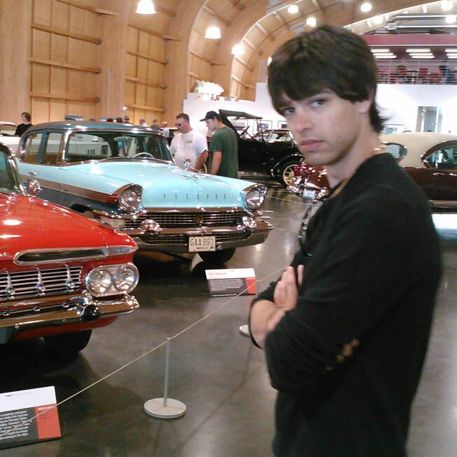 Male model photo shoot of Selig Bernstein in Tacoma Car Museum
