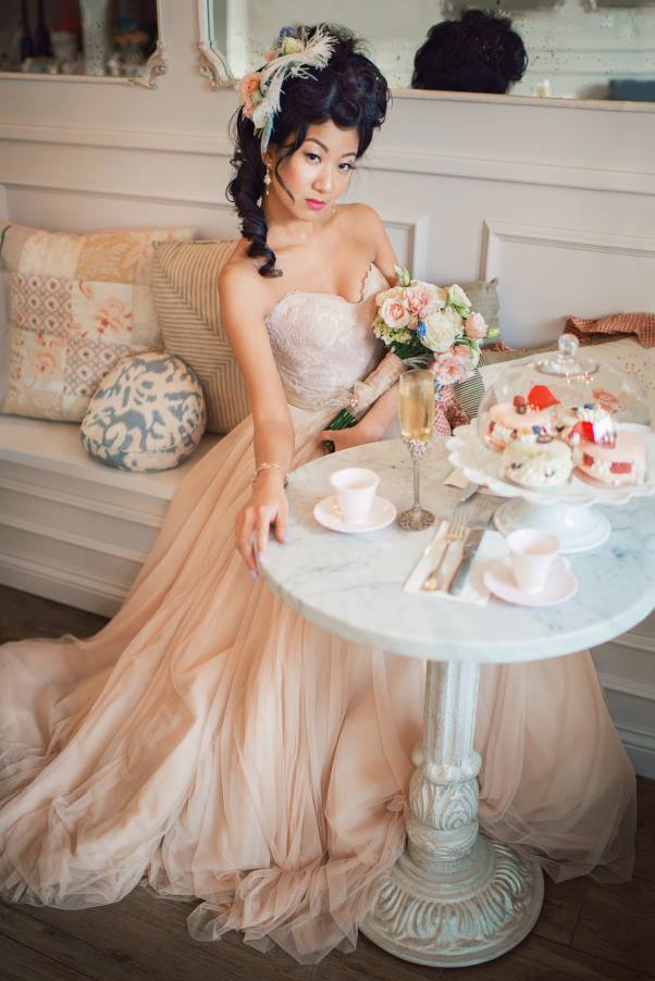 Female model photo shoot of Sydney Jang in The Cake Bake Shop