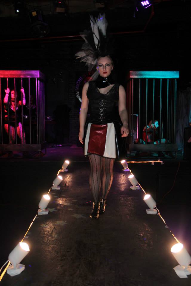 Female model photo shoot of Miss Nyxie in Vice Fashion Show, clothing designed by Cloakmaker