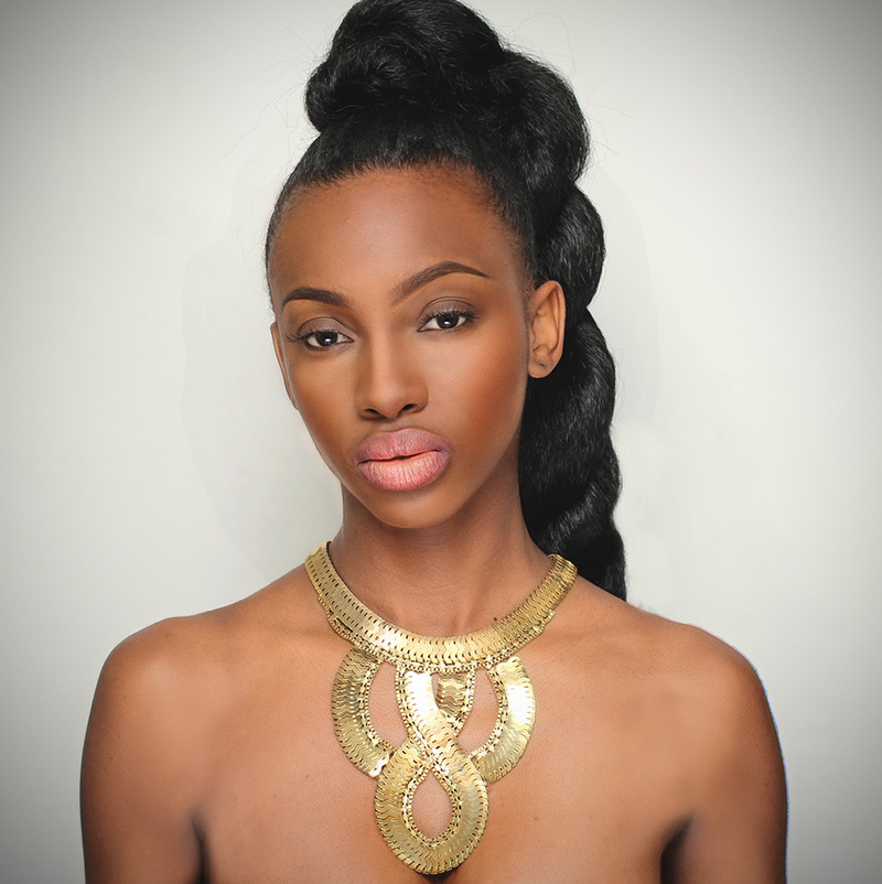 Female model photo shoot of Makeba Hudson in London, makeup by M A L K I A