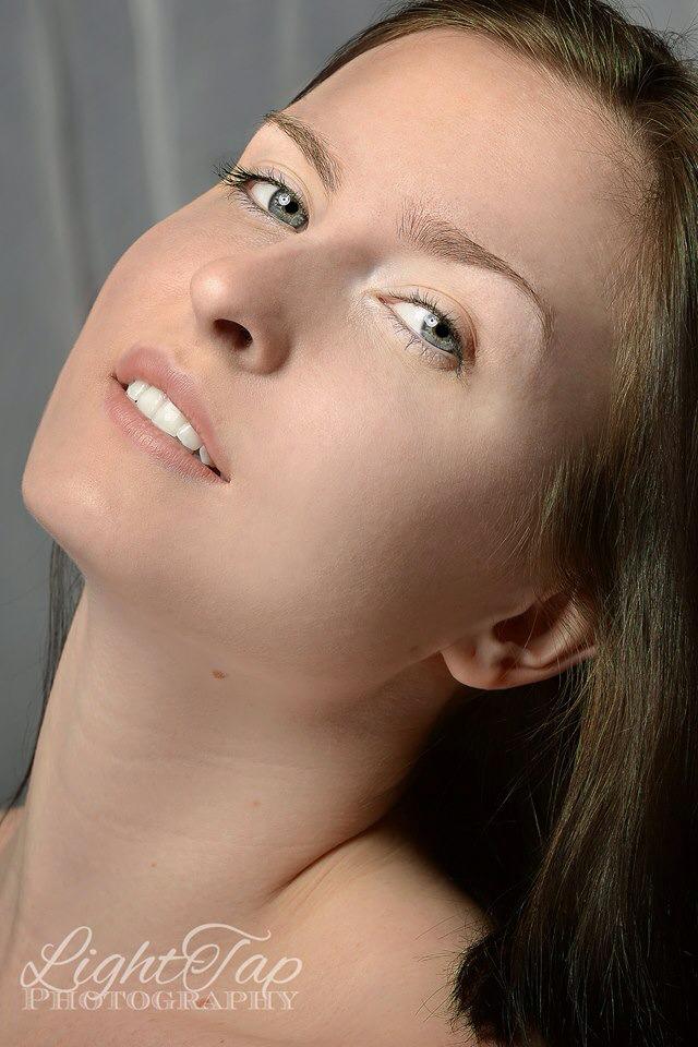 Female model photo shoot of Ittia Dominique Edwards by LightTap