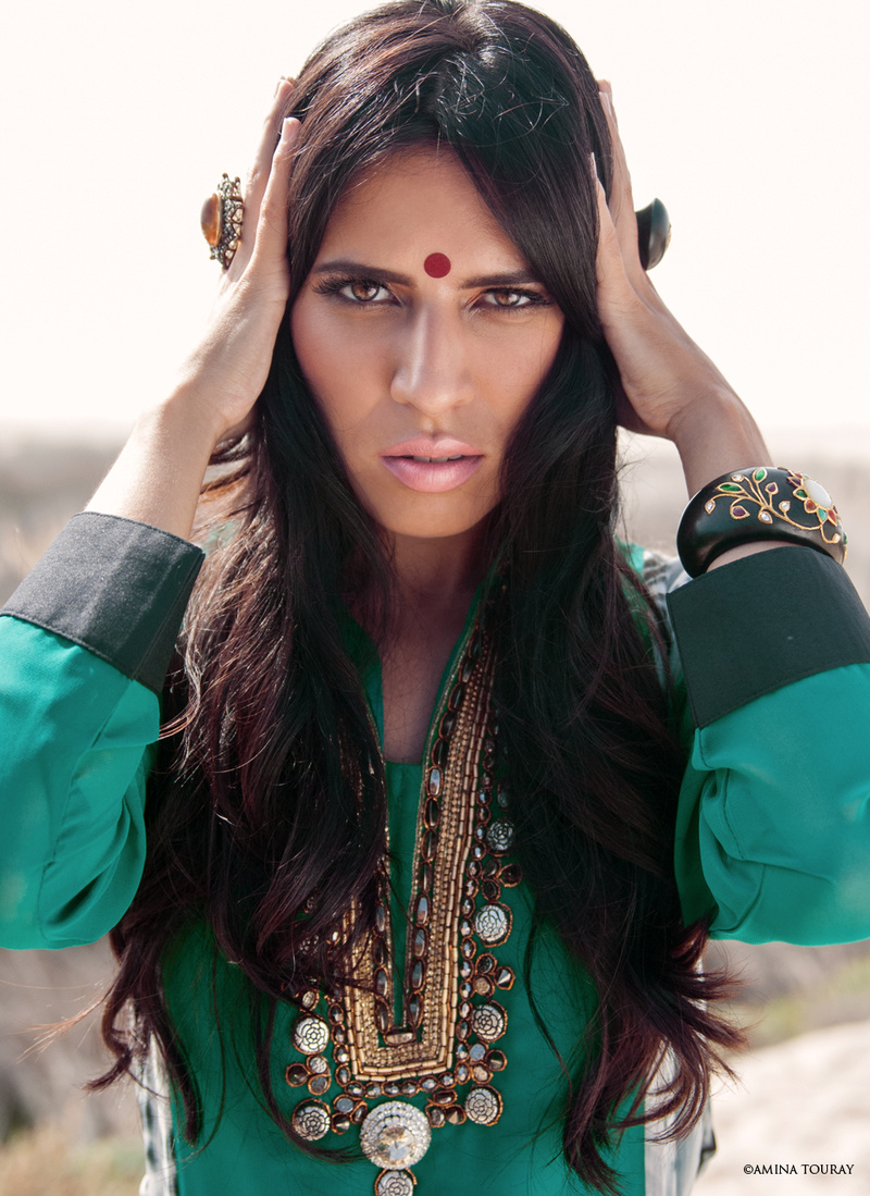 Female model photo shoot of Amina Touray, makeup by Irma Vasquez