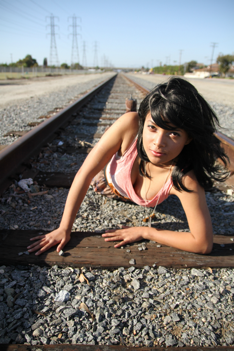 Female model photo shoot of CleopatraOC in Rail Road Tracks