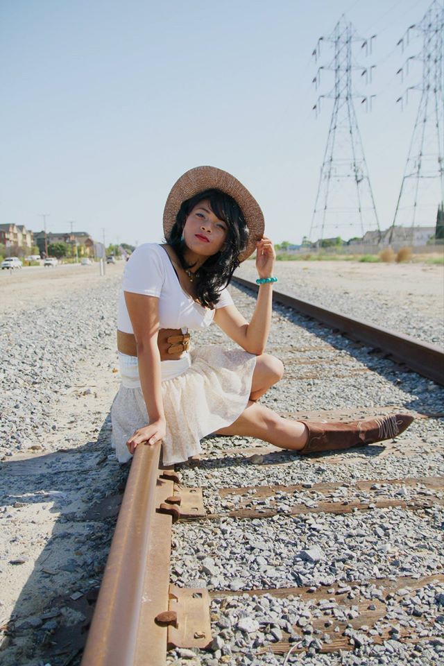 Female model photo shoot of CleopatraOC in Rail Road Tracks
