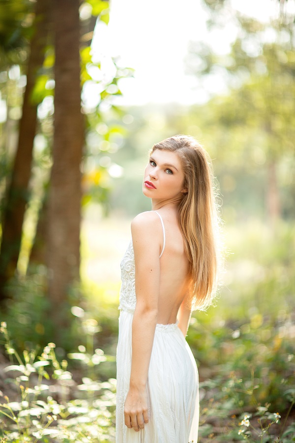 Female model photo shoot of CarolineBrown in river bend park