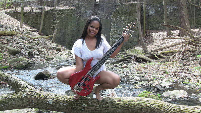 Male model photo shoot of Red Bass Guitar Modeling