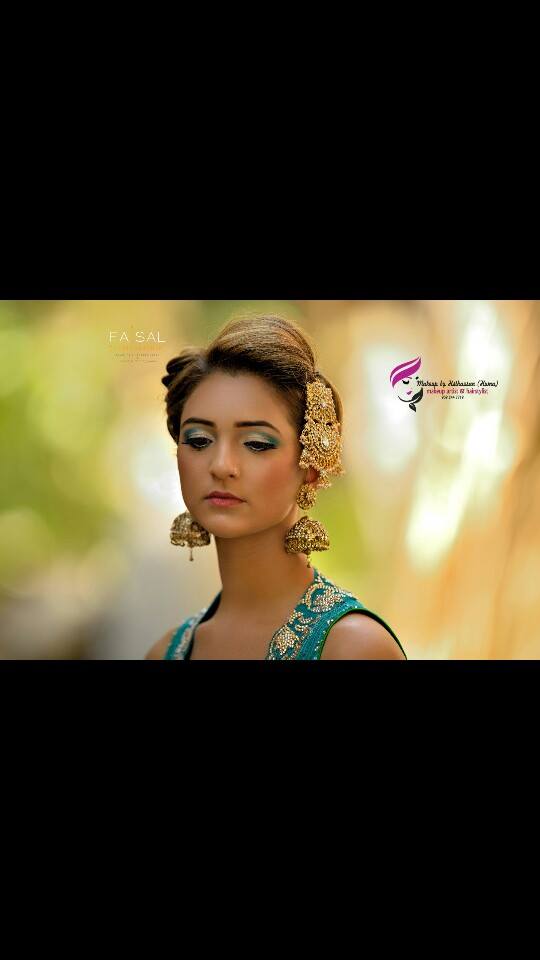 Female model photo shoot of Huma Taimur