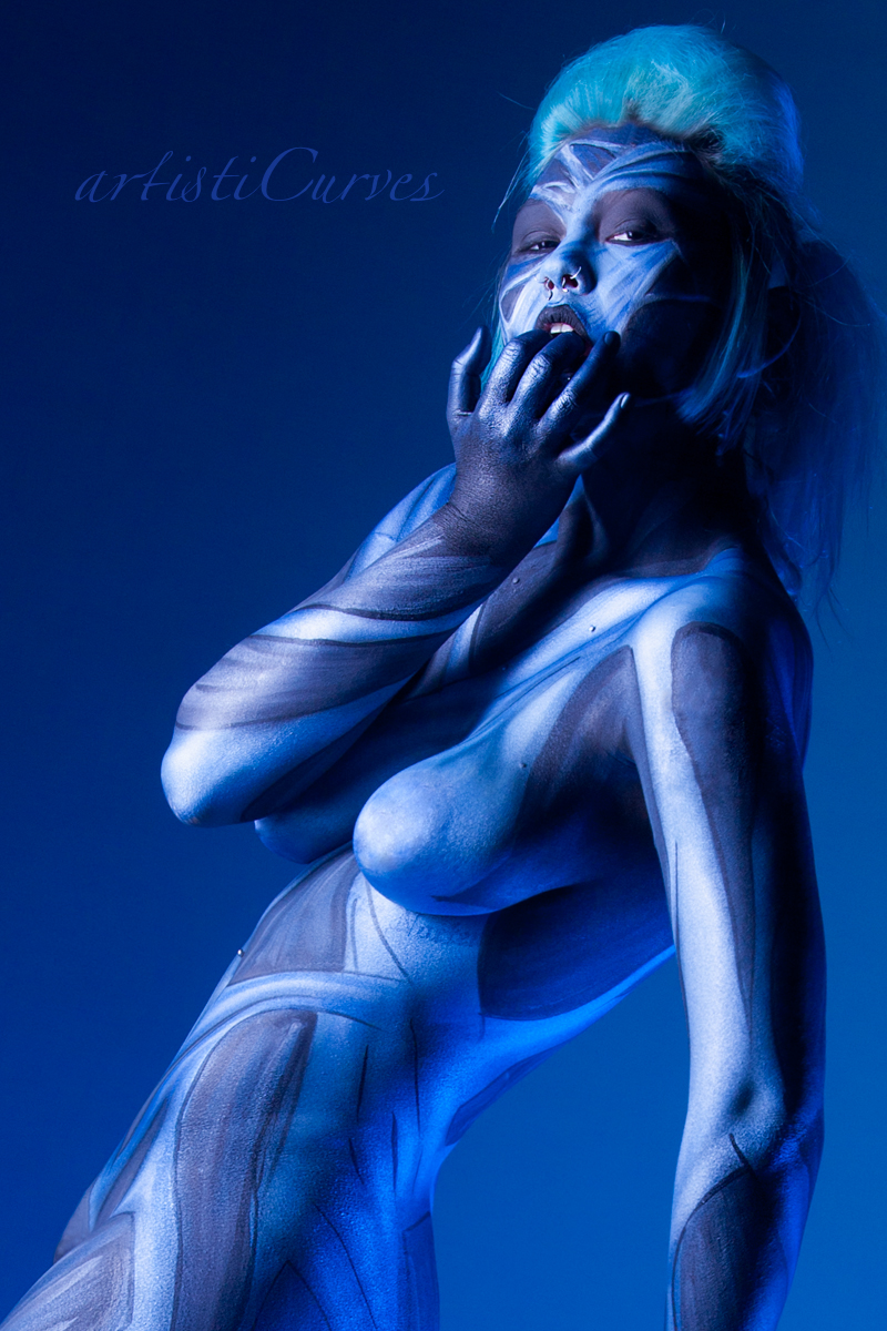 Female model photo shoot of Carapace by ArtistiCurves , body painted by AC Bodypainter