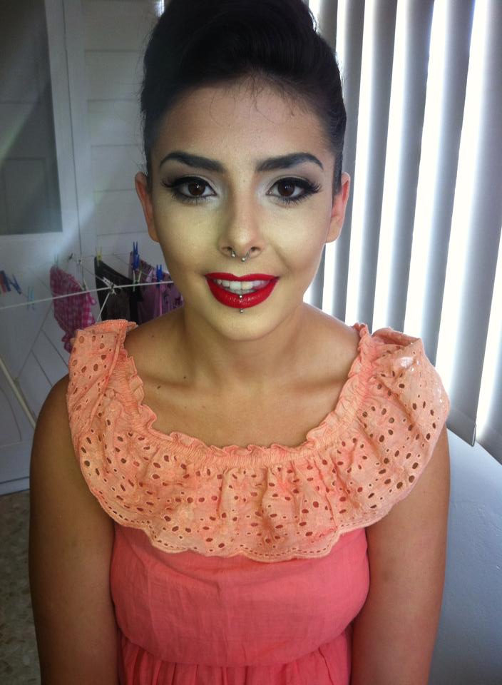 Female model photo shoot of Rhis Makeup Artistry