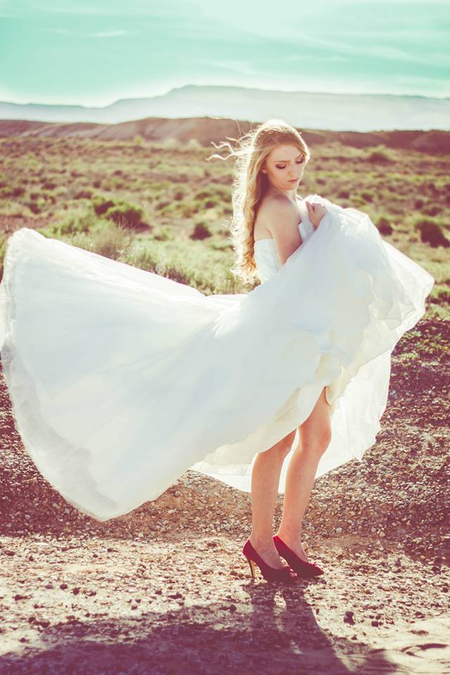 Female model photo shoot of CutesyFrame_FotoCo in Southern Utah