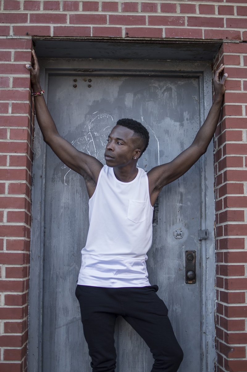 Male model photo shoot of Orlando Parker Jr in Downtown Raleigh, North Carolina
