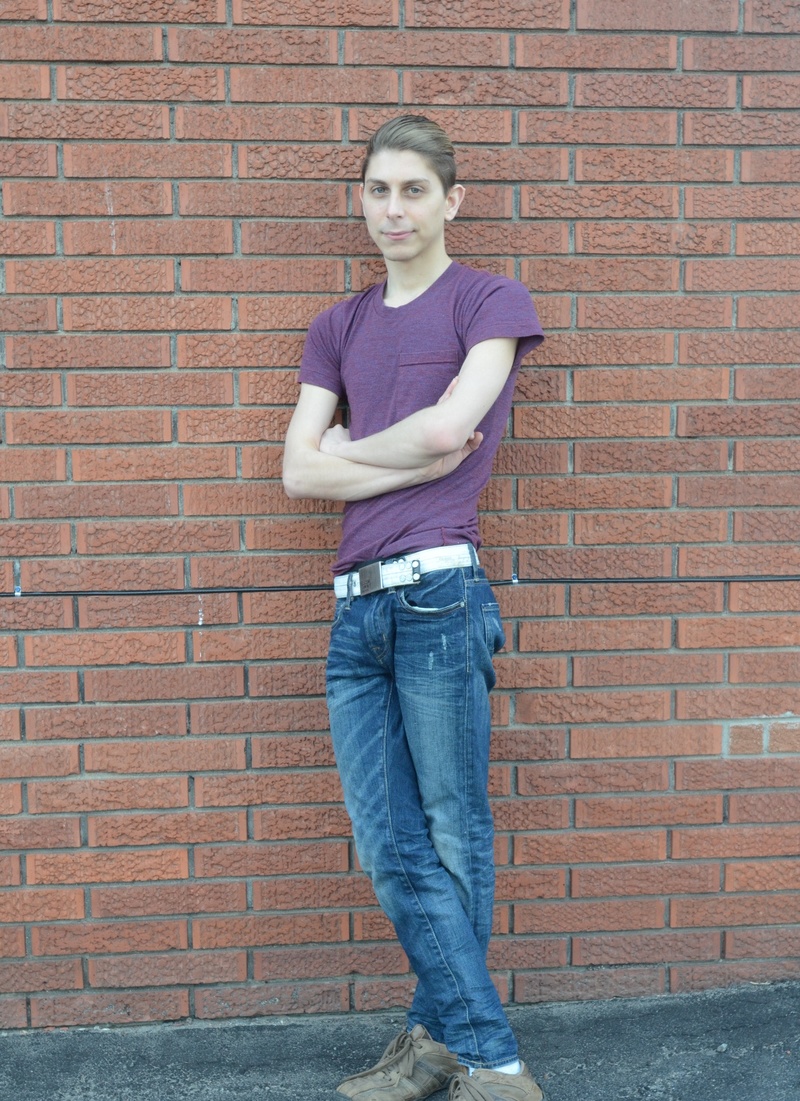 Male model photo shoot of ThatDamnAdam in Brick wall