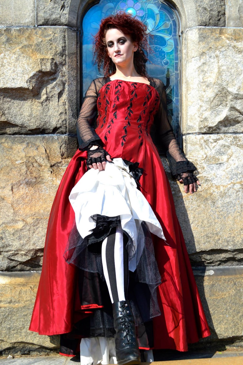 Female model photo shoot of Madame Madness in Oakland Cemetery