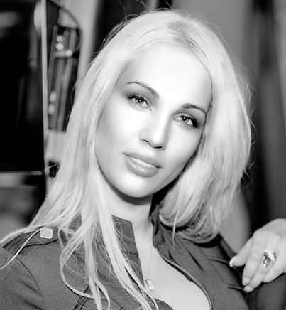 Female model photo shoot of Oxana Gold
