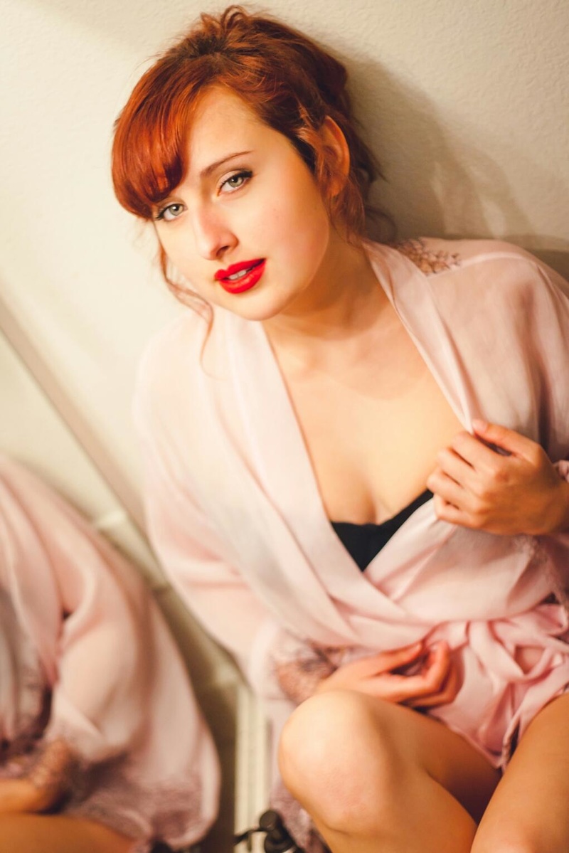 Female model photo shoot of Rose Marie Ruffles in Bathroom