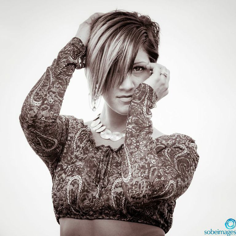 Female model photo shoot of KyraRae by SoBe Images