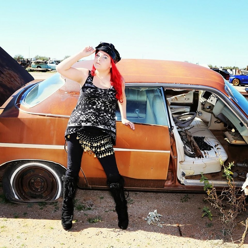 Female model photo shoot of Cedez Romero in Junkyard Shootout Whittman, AZ