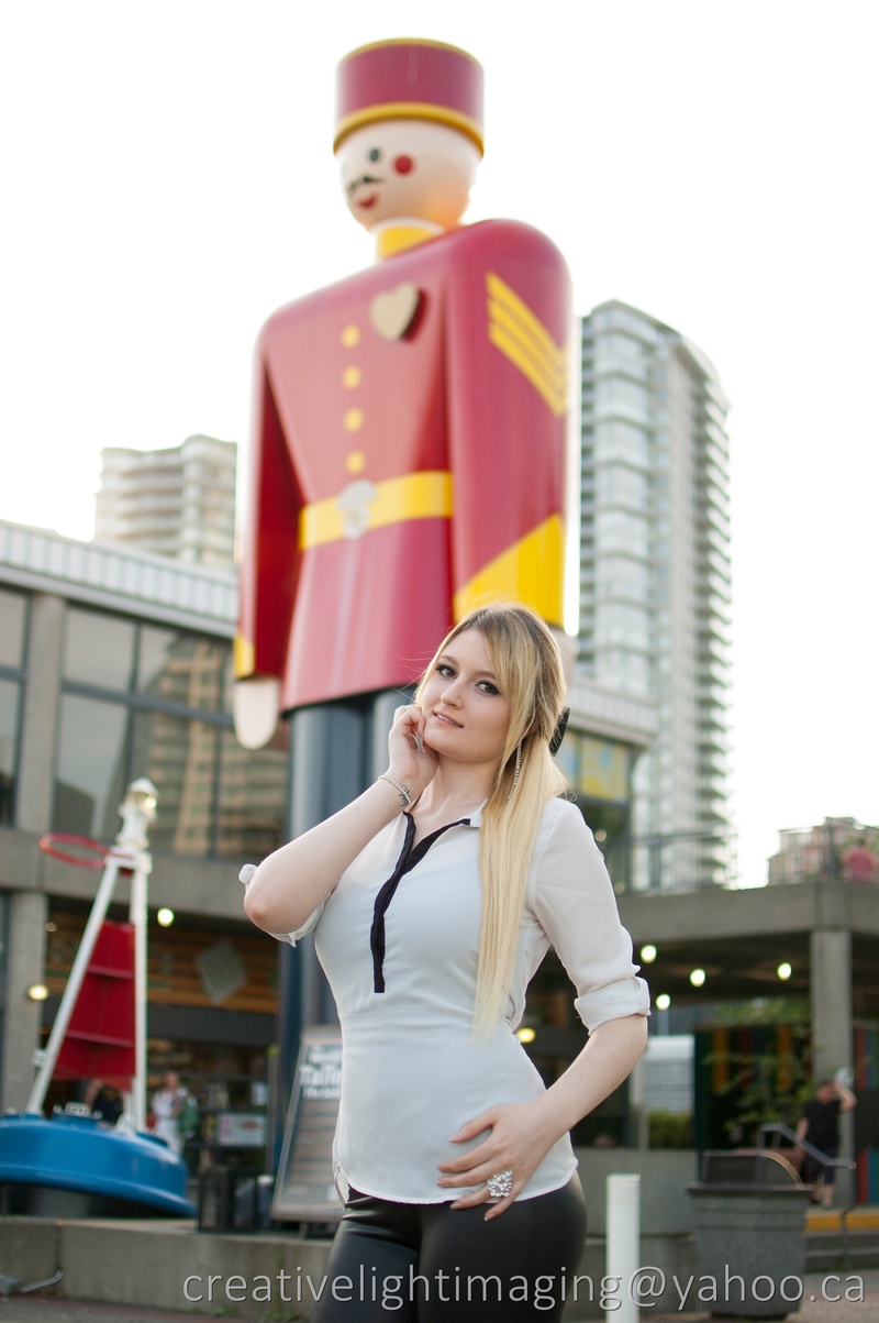 Female model photo shoot of LadyValkyrie by creativelightimaging in New Westminster Quay