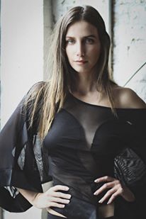 Female model photo shoot of Anastasia Goryachih, clothing designed by Masha Fashion Design