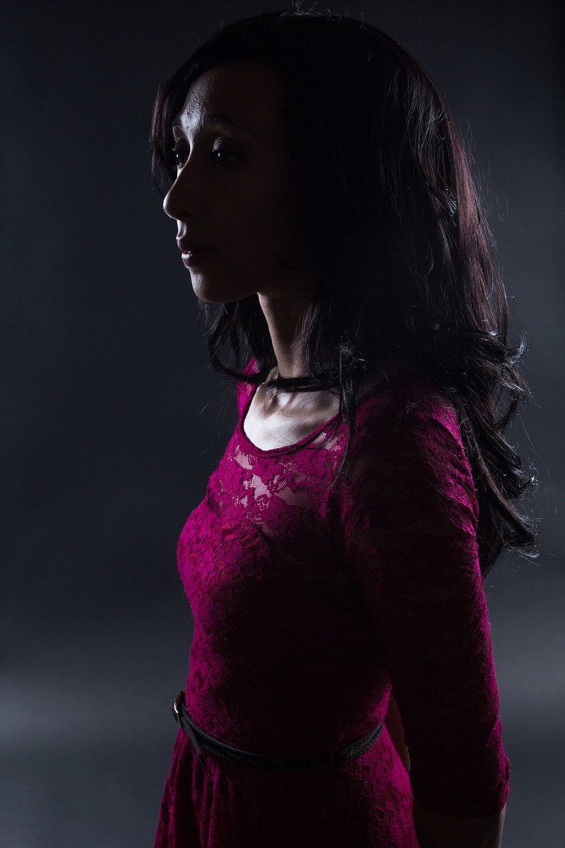 Female model photo shoot of Desi Rayy by DarkEagleStudios in Dark Eagle Studios