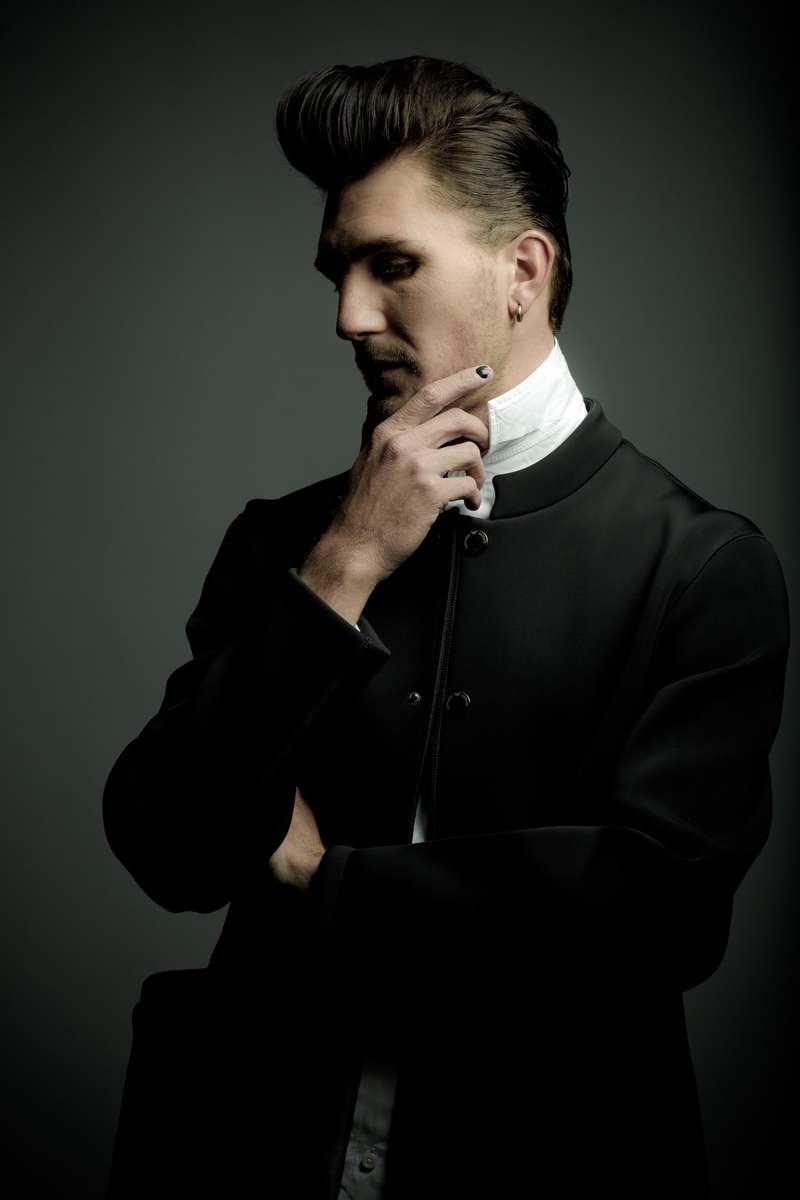 Male model photo shoot of Casey LaRios in Salon Platinum Black