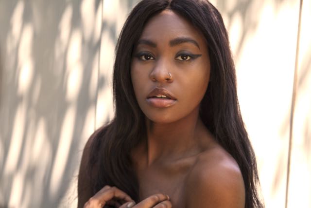 Female model photo shoot of Essaba Uhindu by Tanvi Madkaiker in Toronto, ON