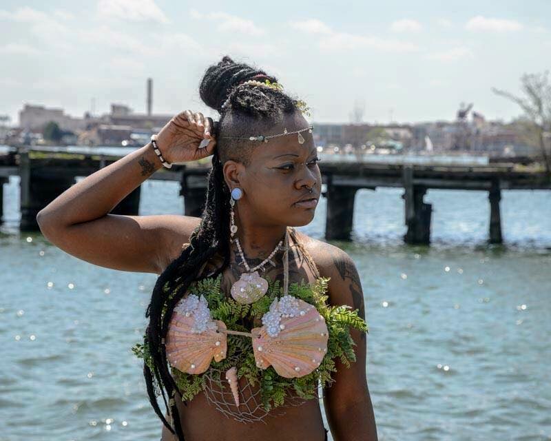 Female model photo shoot of MaliaSeastar in Fells Point "pirate festival"