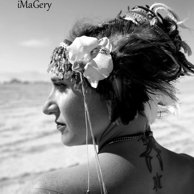 Female model photo shoot of Meg B White Salon in Black Rock Desert , Nevada