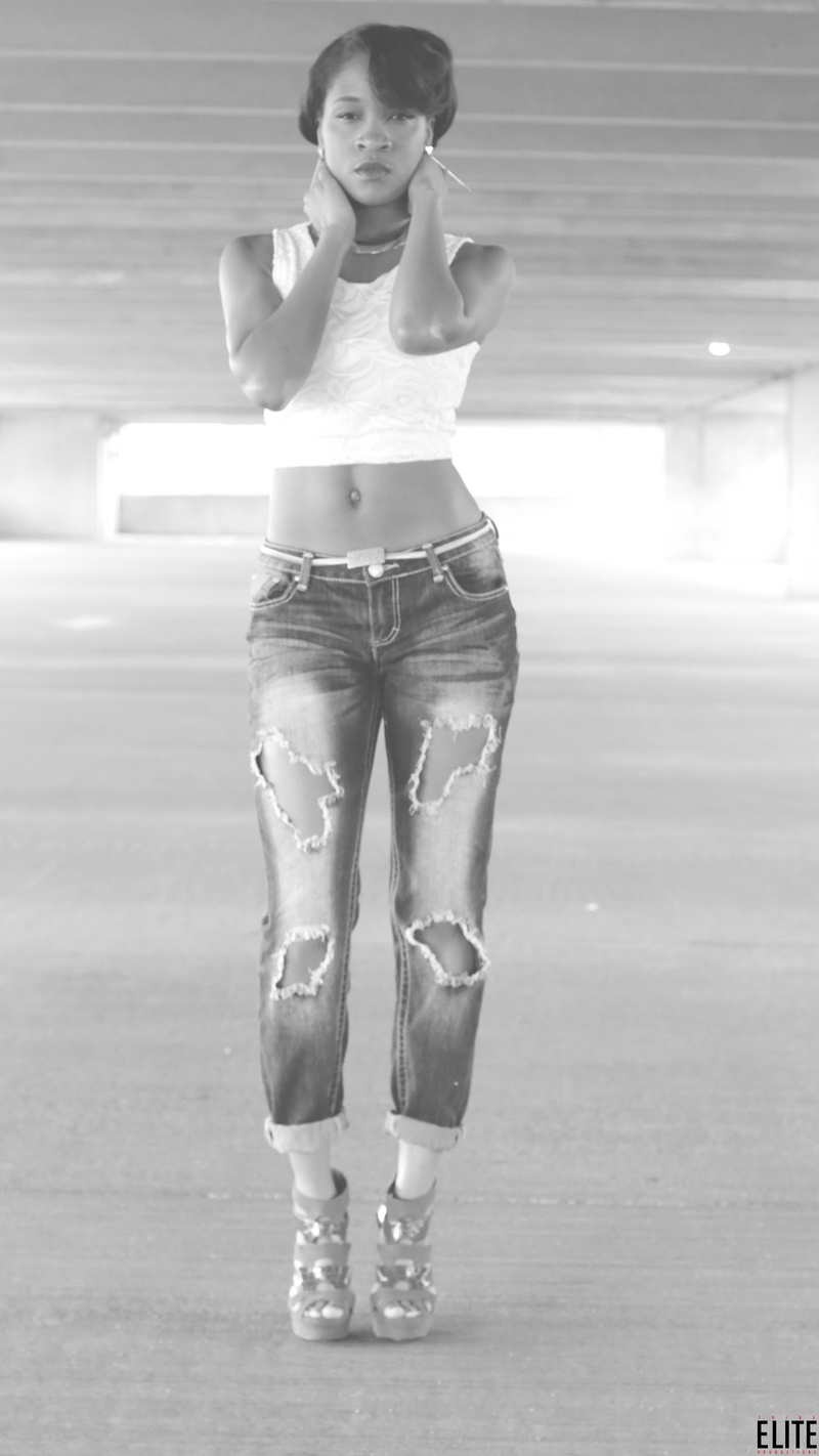 Female model photo shoot of TyShan in Largo Town Center Metro Station Parking Garage