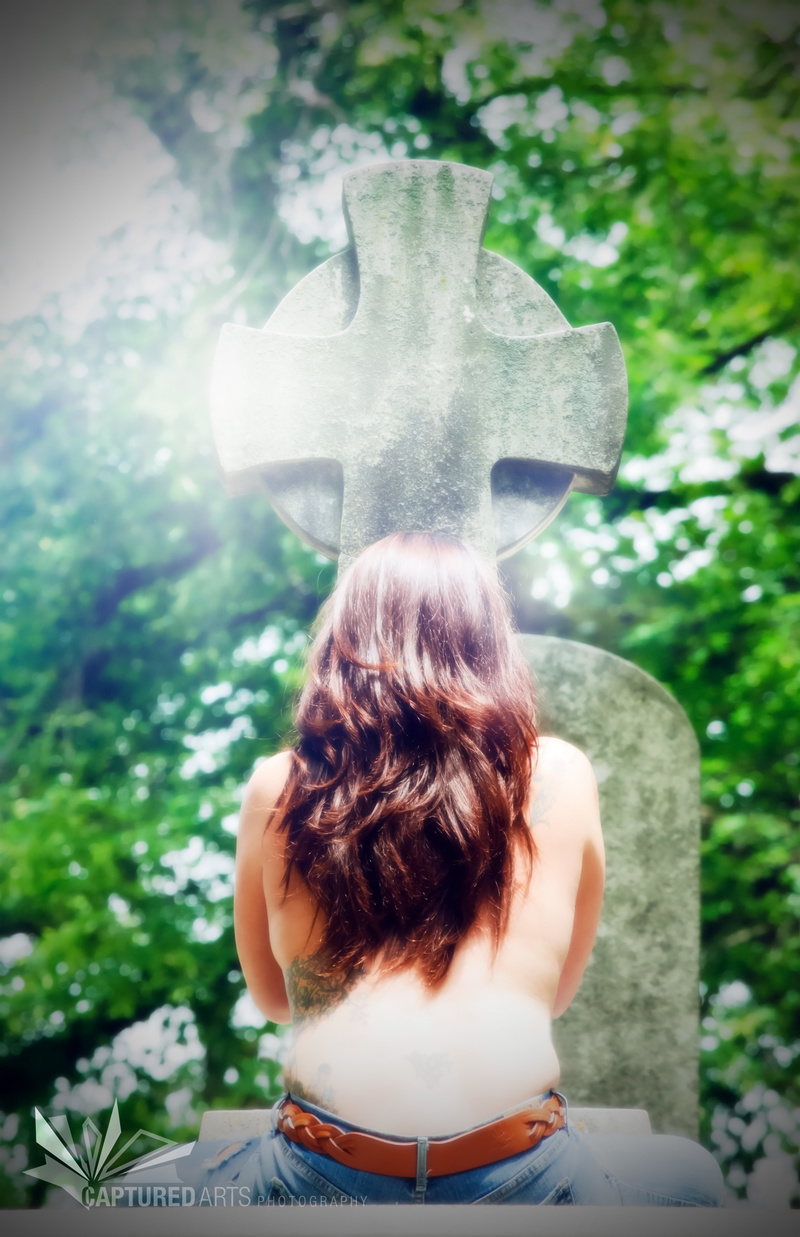 Female model photo shoot of Captured Arts Photography in Laurel Hill Cemetery Philadelphia Pa