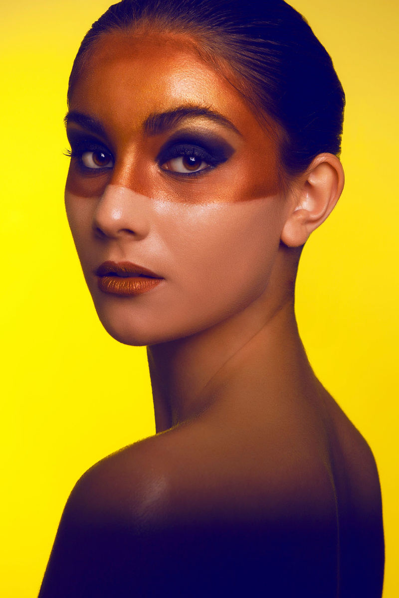 Female model photo shoot of Lamore Makeup Artistry