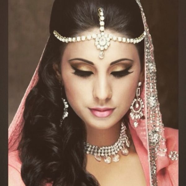 Female model photo shoot of Rasheda Makeup