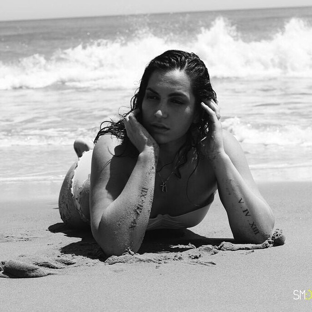 Female model photo shoot of AmiraJuma in Chix beach