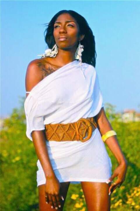 Female model photo shoot of Belizean royal