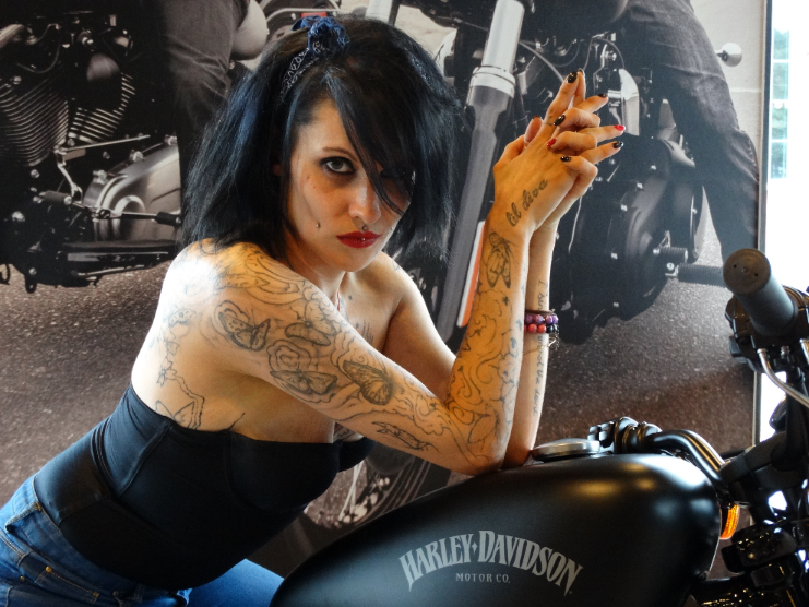 Female model photo shoot of Bellez Black  in Harley Davidson