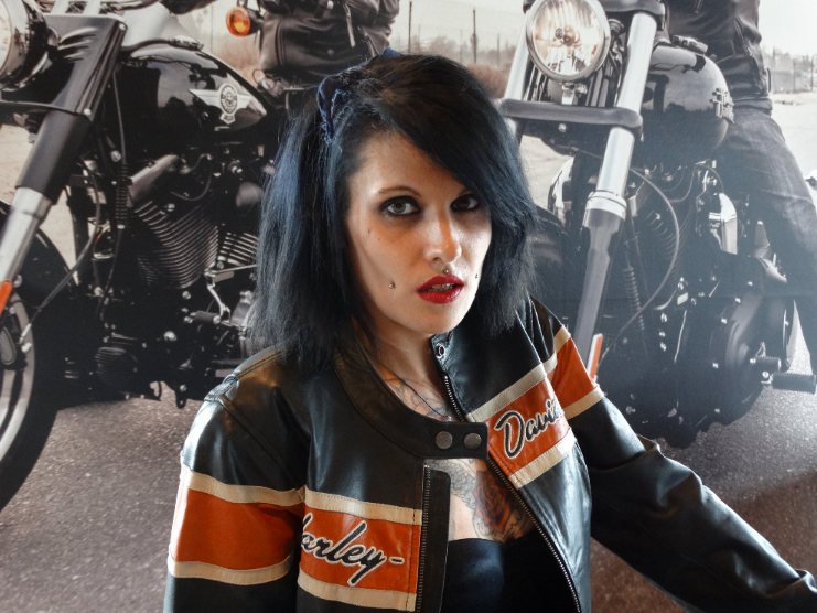 Female model photo shoot of Bellez Black  in Harley Davidson