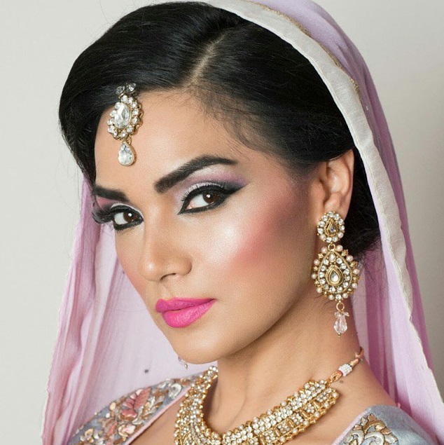Female model photo shoot of Makeup by Sadia in Birmingham
