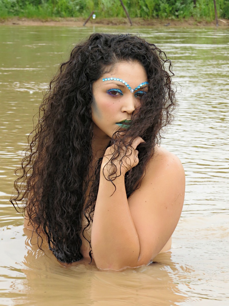Female model photo shoot of Eccentrically Captured  in River