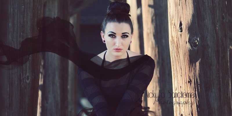 Female model photo shoot of Nicky La Sanctionne