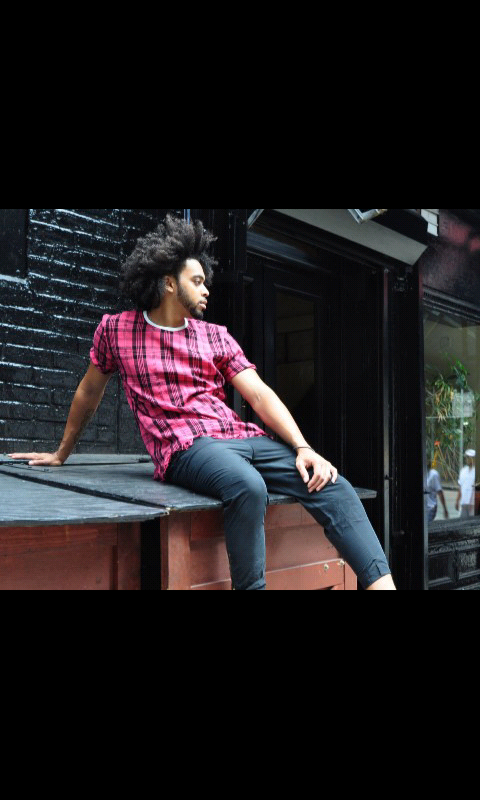 Male model photo shoot of DuVall D in SoHo, clothing designed by Semitic Tribebs