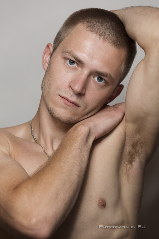 Male model photo shoot of Photography by RJ and Kristaps Zvaigzne