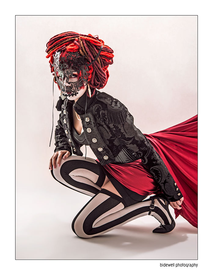 Female model photo shoot of Onyx Satvil by bidewell photography, makeup by Martha Tello Rosser
