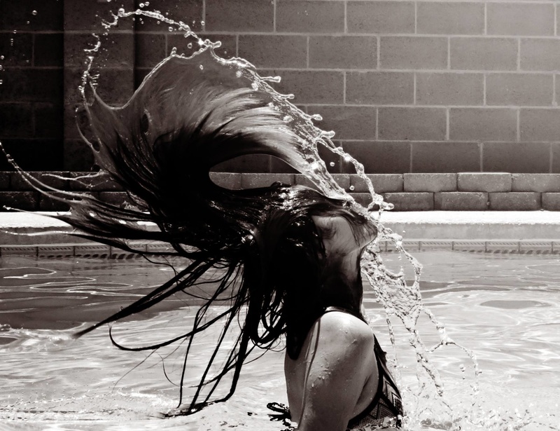 Female model photo shoot of Eccentrically Captured  in Pool