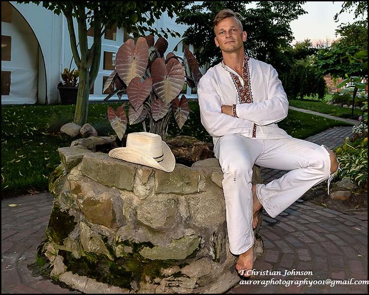 Male model photo shoot of Xavier T in Windmill Island, MI.