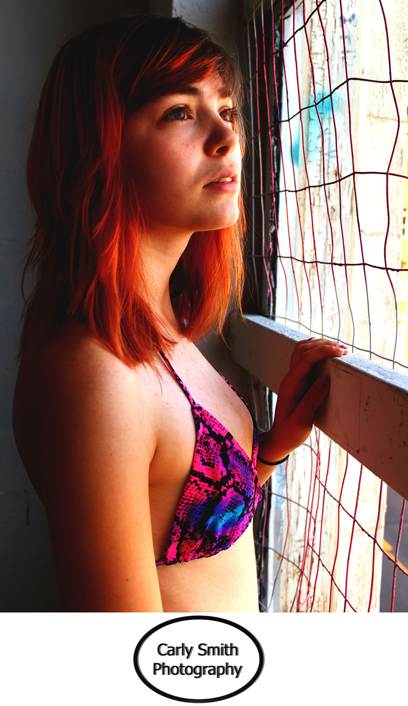 Female model photo shoot of CarlySmithsPhotography and Starrw96 in Tacoma Graffiti Garage