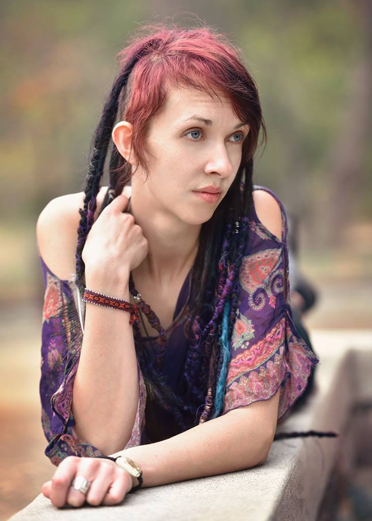 Female model photo shoot of Purple Widow by JackHPhoto