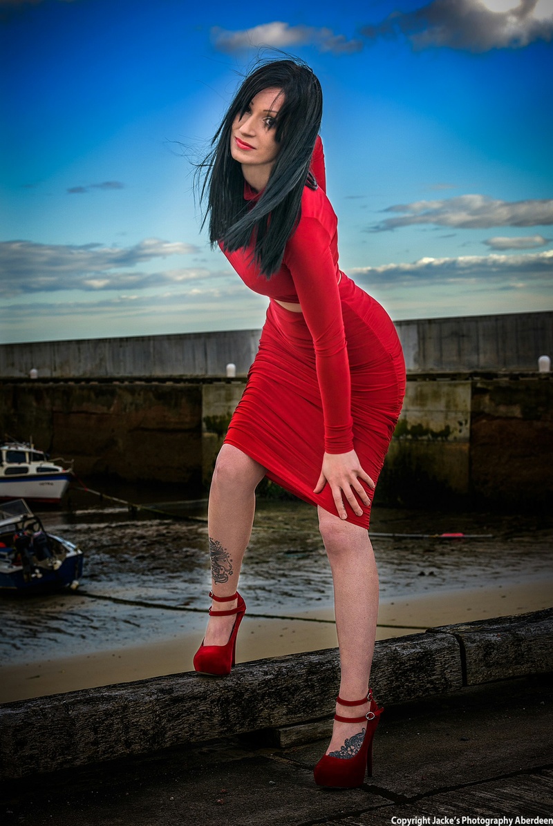 Female model photo shoot of Kat Spriggs in Cruden Bay Harbour