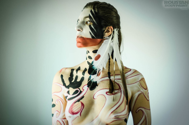 Female model photo shoot of Coyote Girl, body painted by Roustan