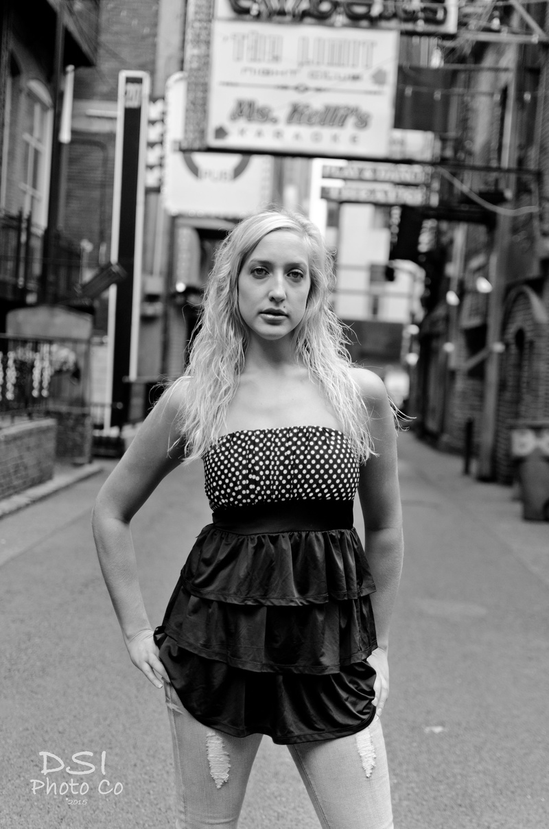 Male and Female model photo shoot of DSI Photo Co and EmilyGSmith in Printers Alley Nashville, TN